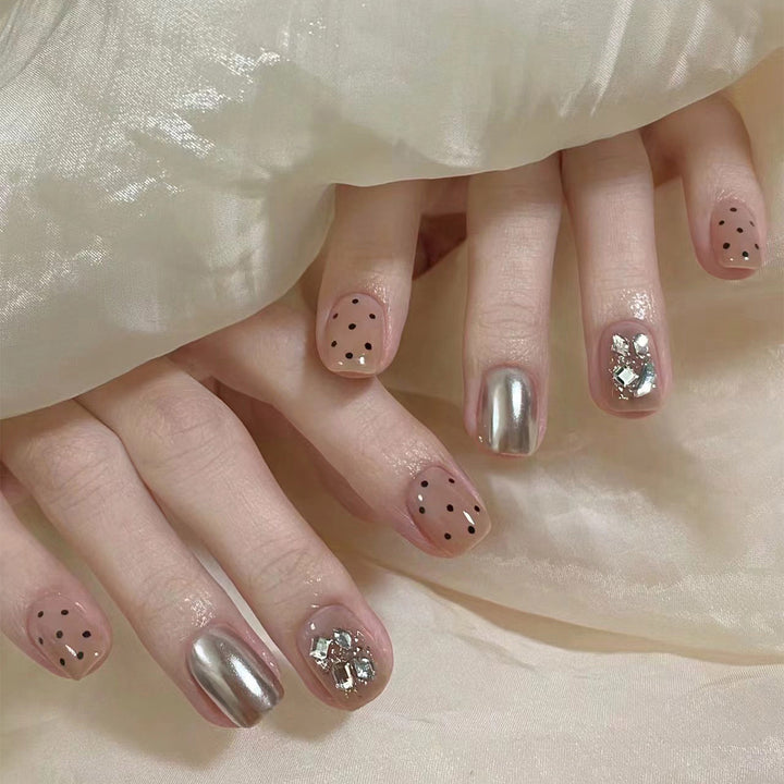 Artificial nail extensions with elegant accent decoration Stornfield