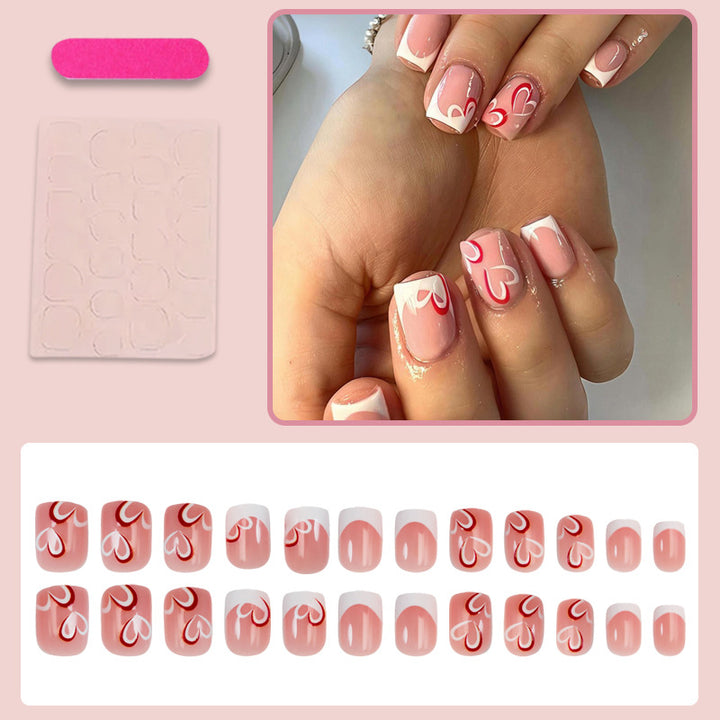 Artificial nail set with intricate floral design and elegant details Stornfield