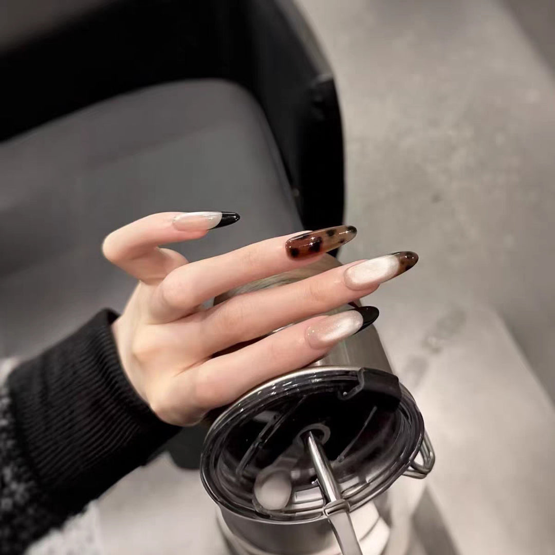 Artistic Press-On Nail Set with Elegant Floral and Gemstone Accents Stornfield