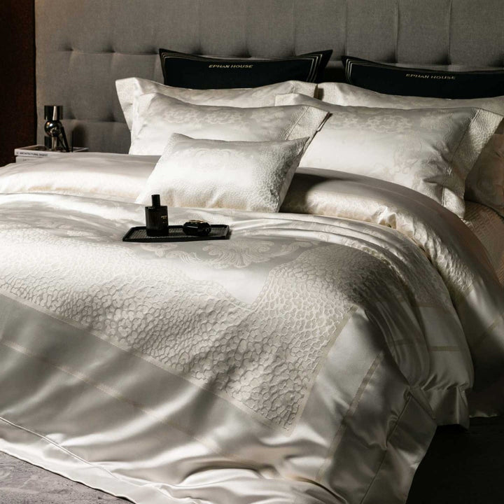 Jacquard bedding set made of cotton satin with embossed medallion and pillow ruffle