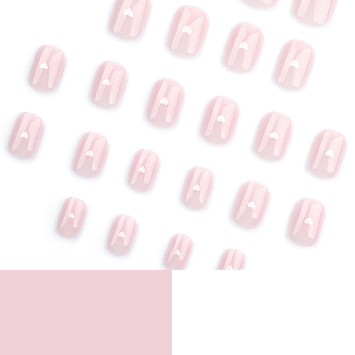 Fake nails with heart decoration Stornfield