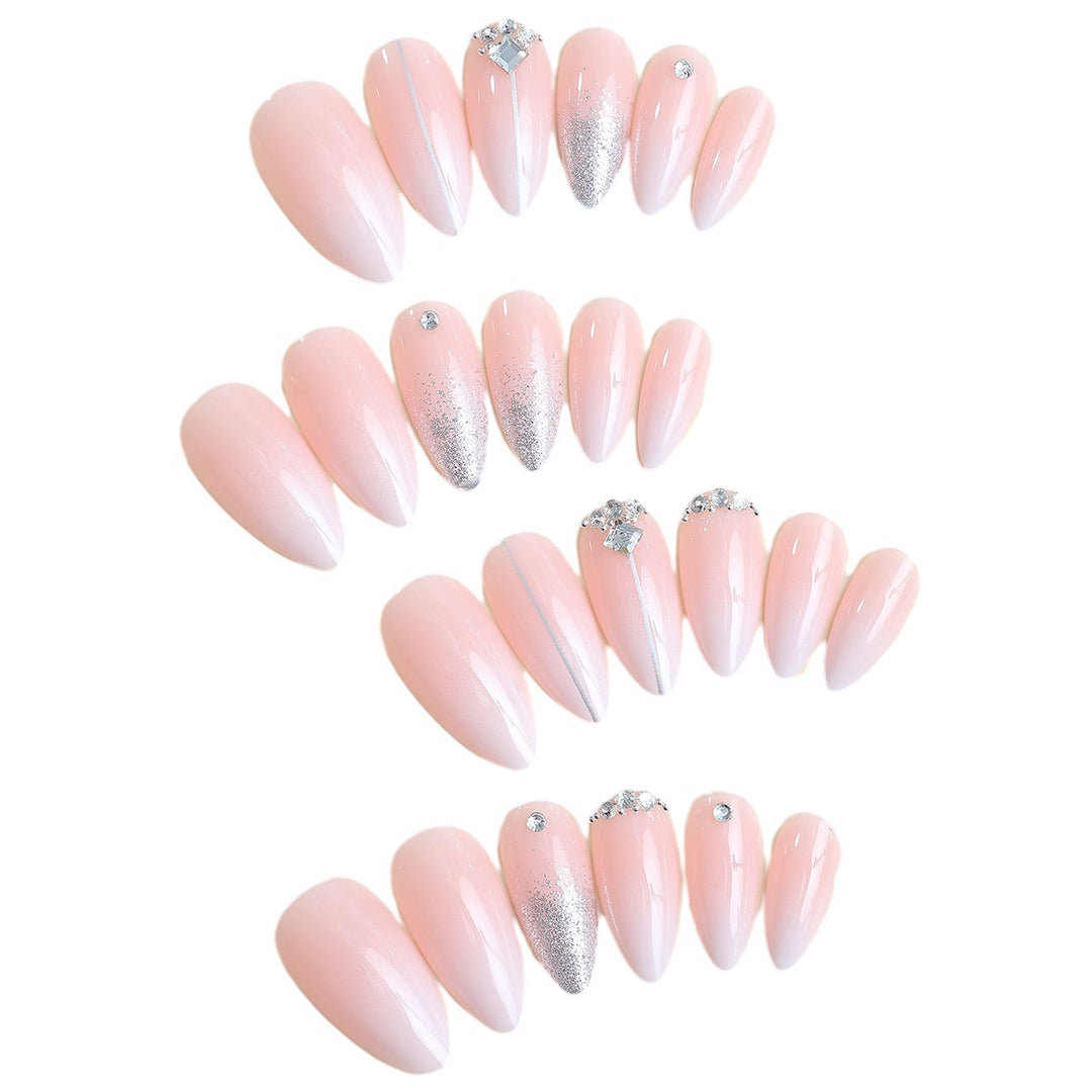 Artificial nail set with elegant glitter and rhinestone accents Stornfield