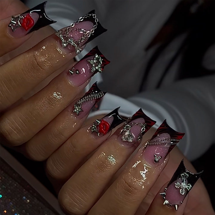 Artificial nails with glamorous 3D decorations and noble accents Stornfield