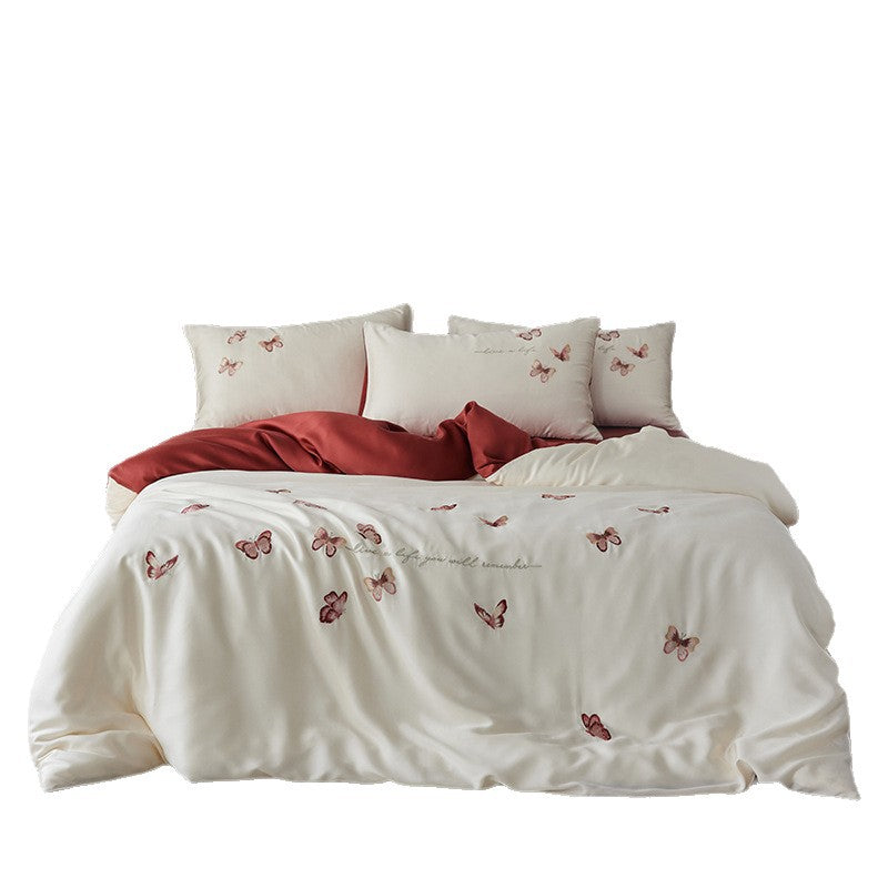 Luxurious cotton satin duvet cover set with embroidered butterfly designs and reversible design