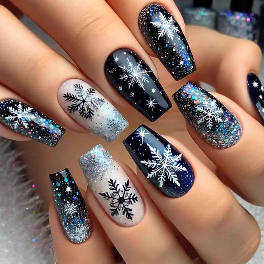 Nail art set with sparkling snowflakes and glitter accents Stornfield