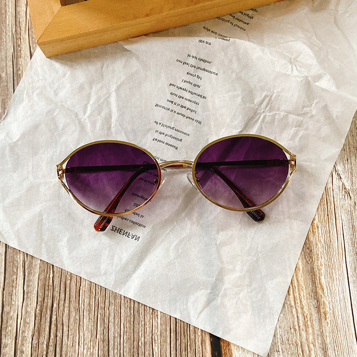 Round Sunglasses with Golden Accents Stornfield