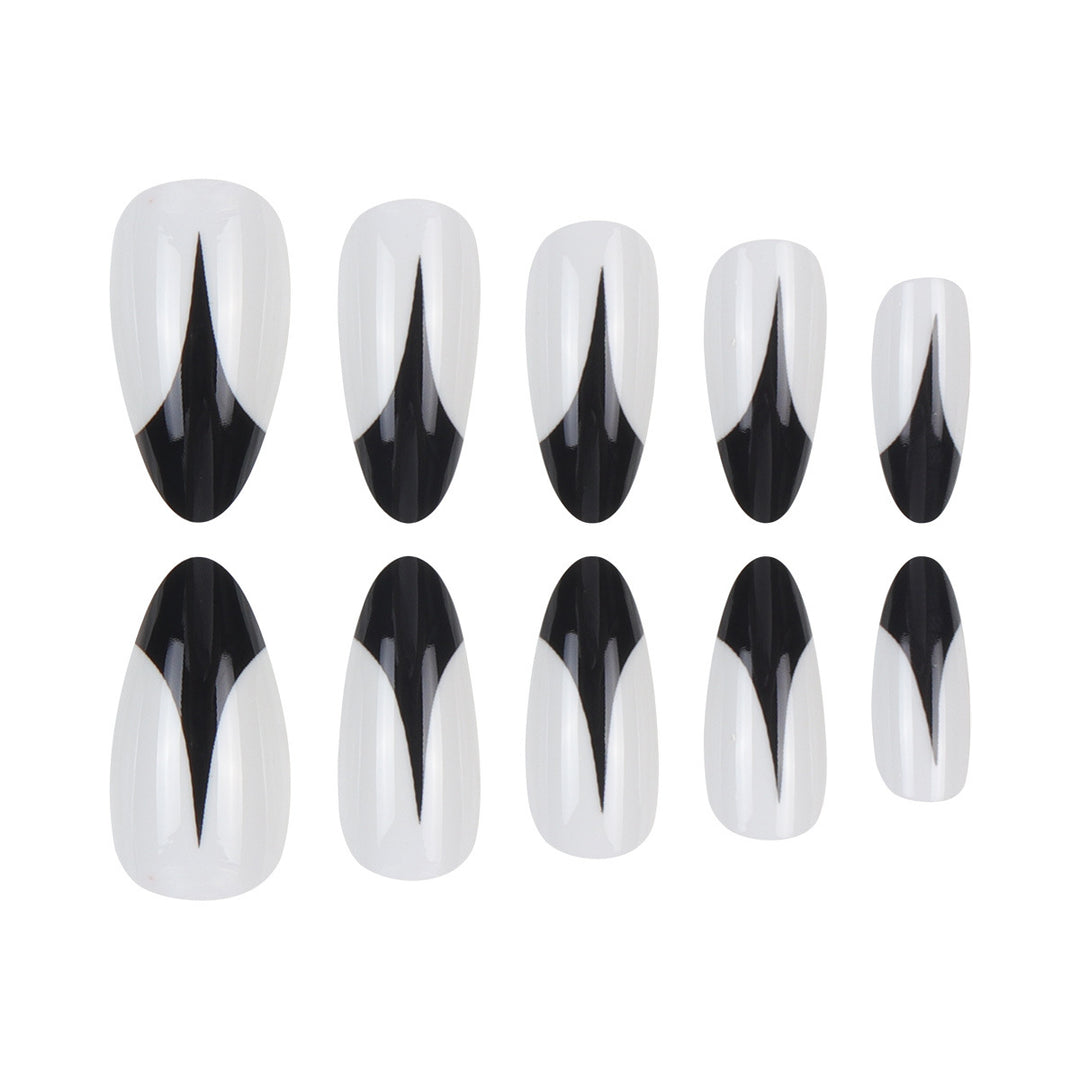 Trendy Stiletto Press-On Nails with Artistic Black and White Design Stornfield