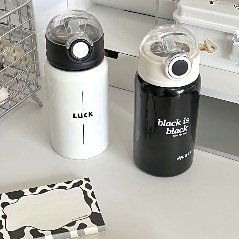 Women's insulated drinking bottle with innovative flip lid and practical handle Stornfield