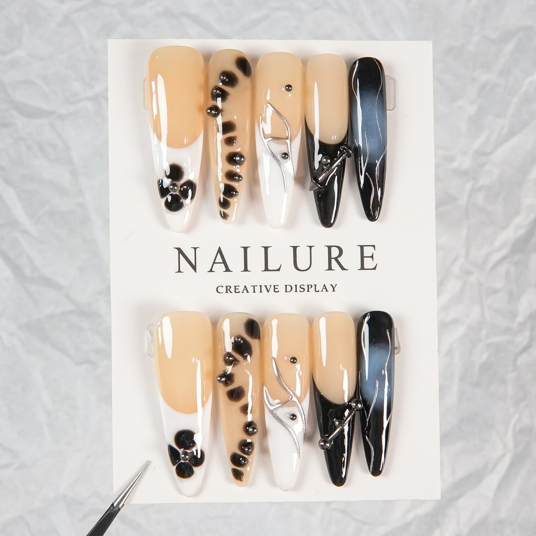 Artistic Stiletto Press-On Nails with Unique Patterning