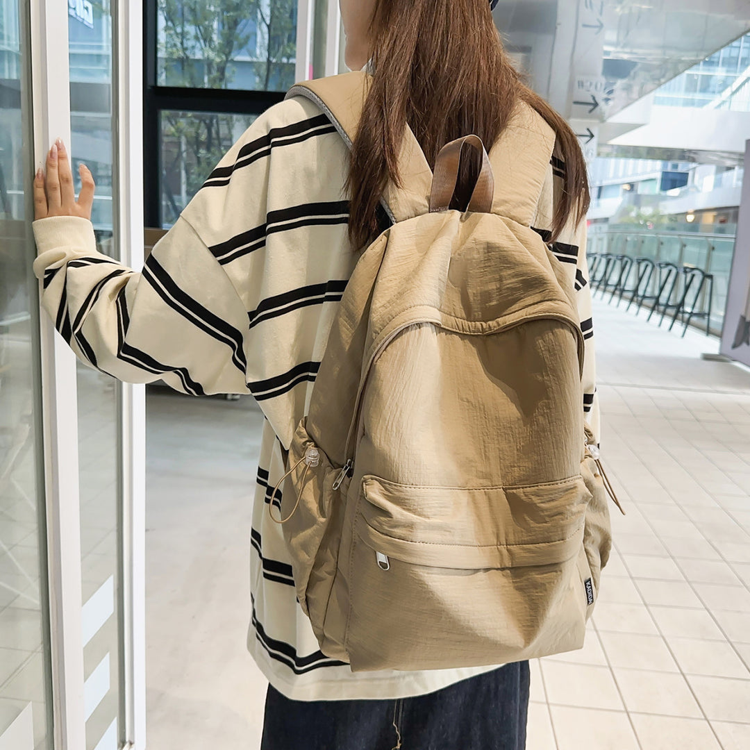 Sporty backpack with practical side pockets Stornfield