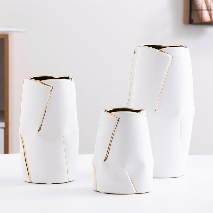 Decorative ceramic vase with golden accents Stornfield