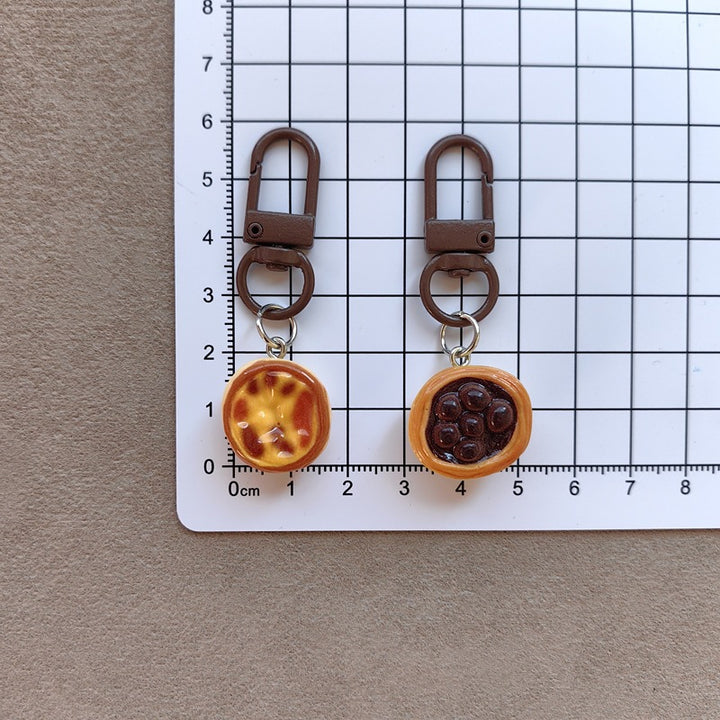 Keychain with cute cake design Stornfield