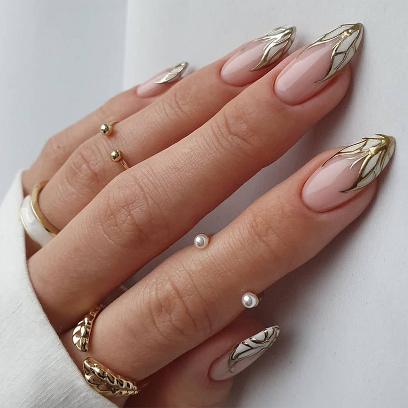 Artful stiletto nails with heart-shaped accents Stornfield