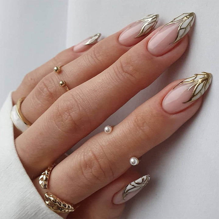 Artful stiletto nails with heart-shaped accents Stornfield