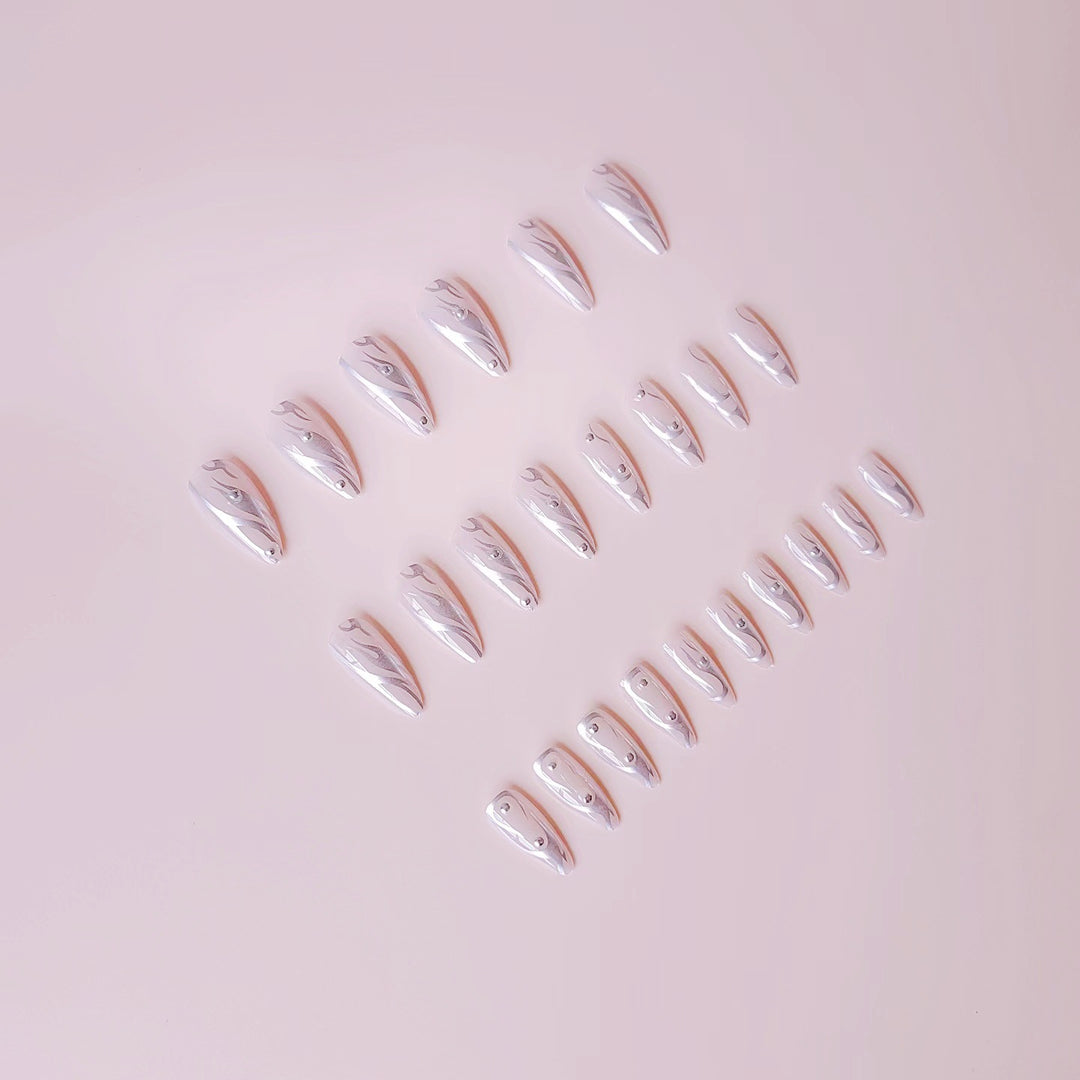 Nail set with elegant water drop design and 3D accents Stornfield