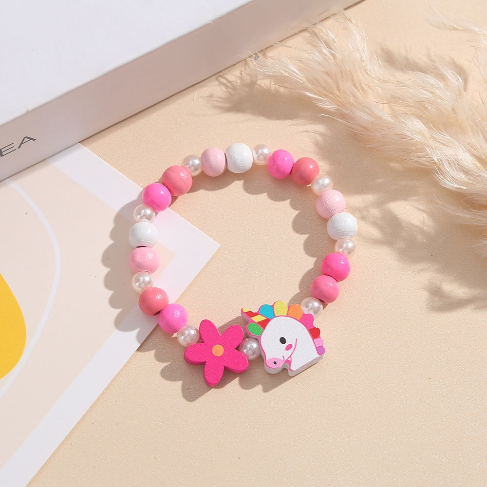 Playful children's bracelet with unicorn and flower motif Stornfield