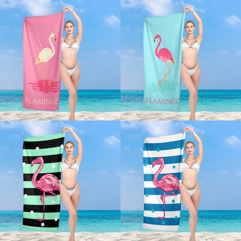 Premium beach towel with vibrant flamingo design Stornfield