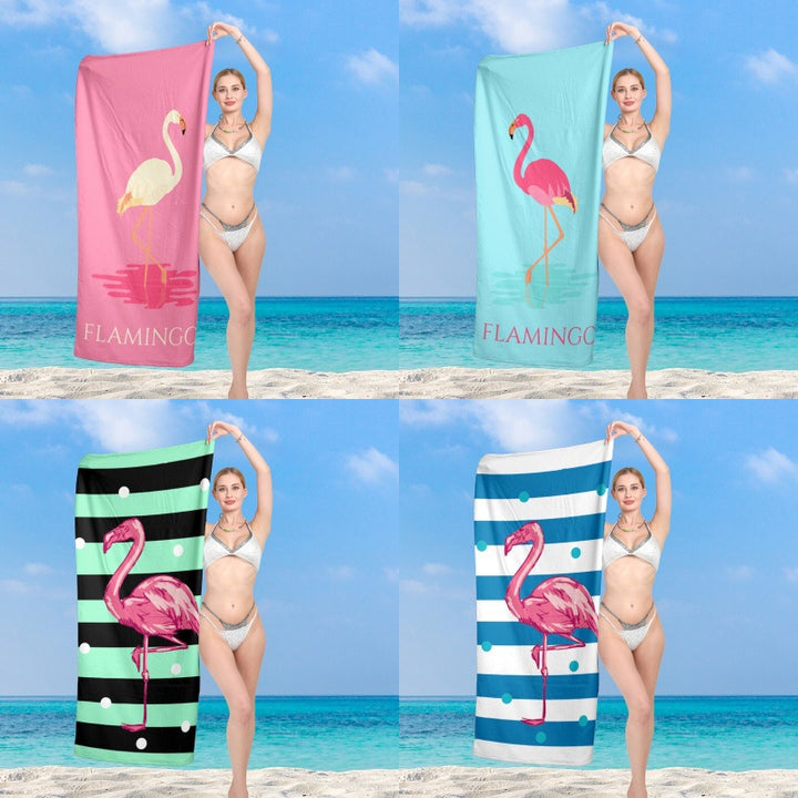 Premium beach towel with vibrant flamingo design Stornfield