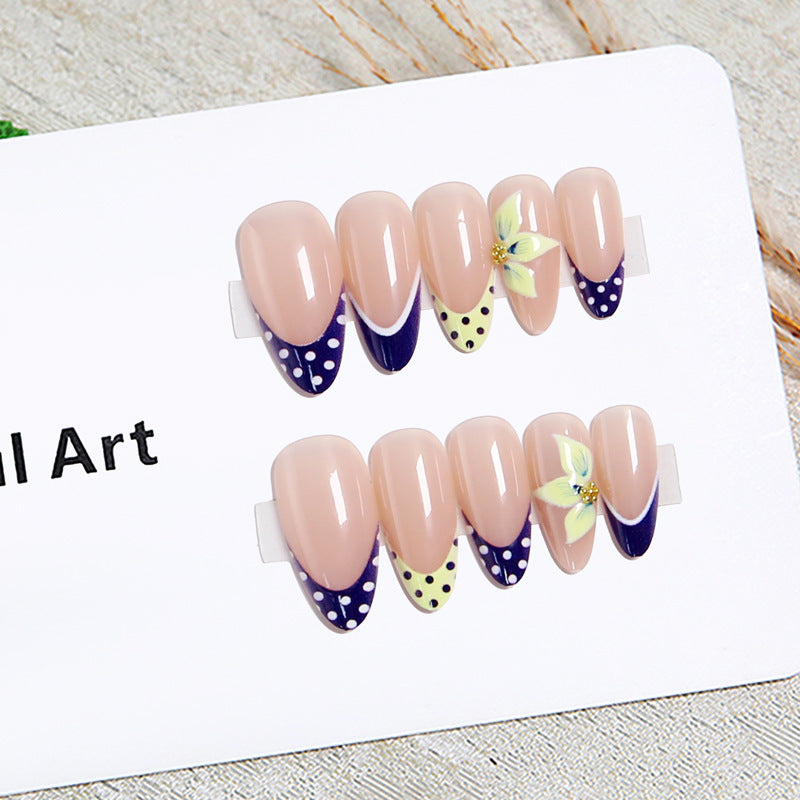 Artful nail tips with floral accent Stornfield