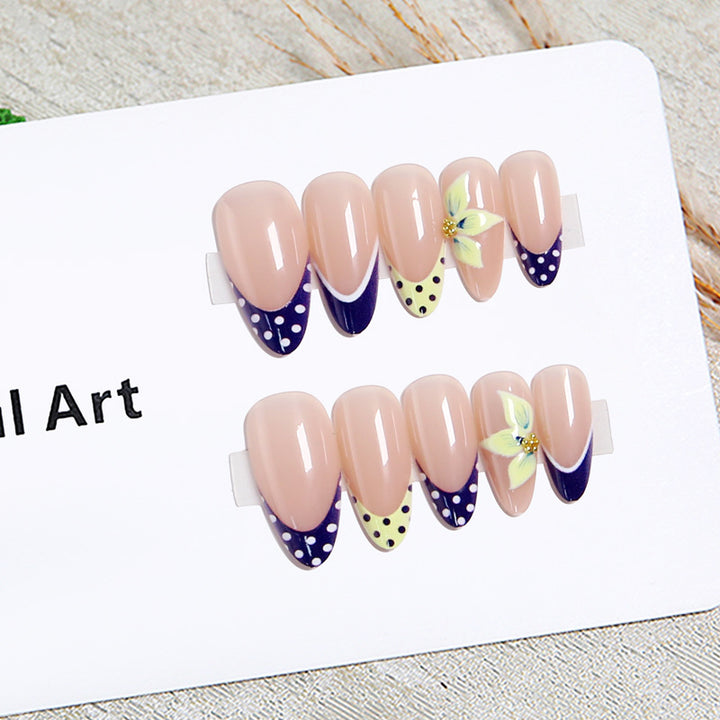 Artful nail tips with floral accent Stornfield