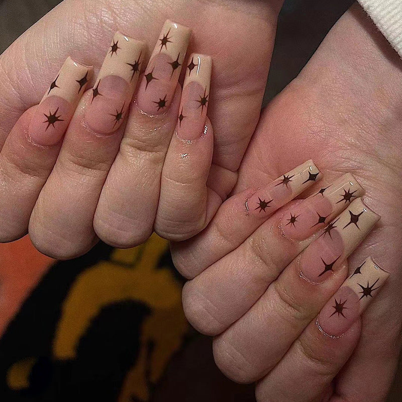 Artistic Nail Extensions with Elegant Star Design Stornfield