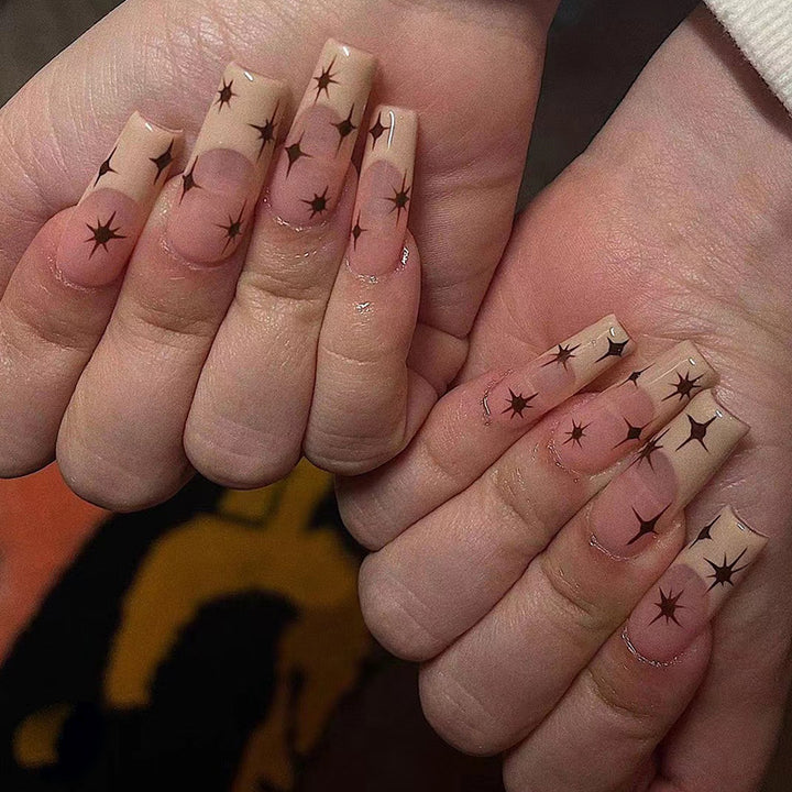 Artistic Nail Extensions with Elegant Star Design Stornfield