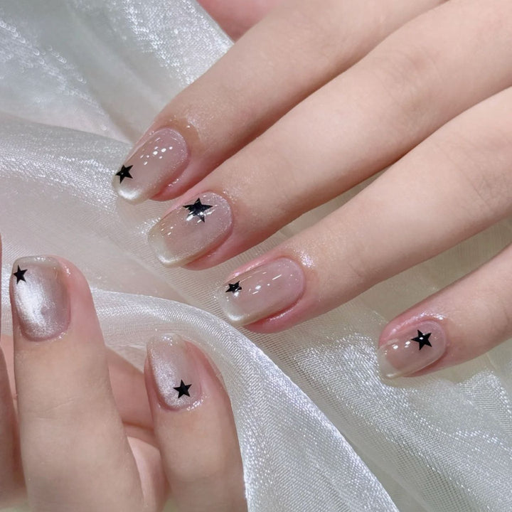 Artistic Press-On Nail Set with Star Designs Stornfield