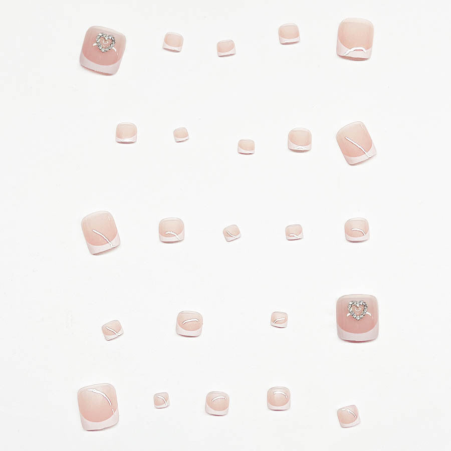 Acrylic nail set with playful heart design Stornfield
