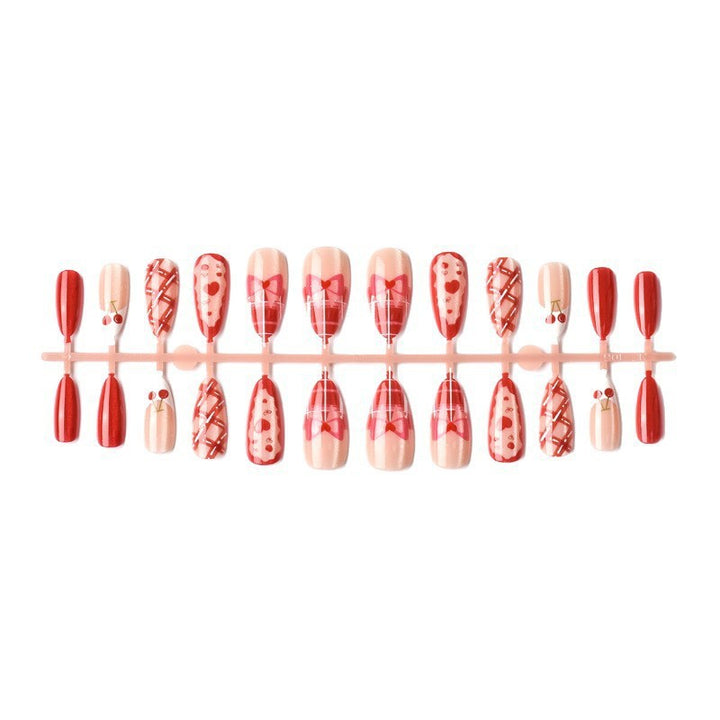 Artificial nail set with playful heart and cherry motifs Stornfield