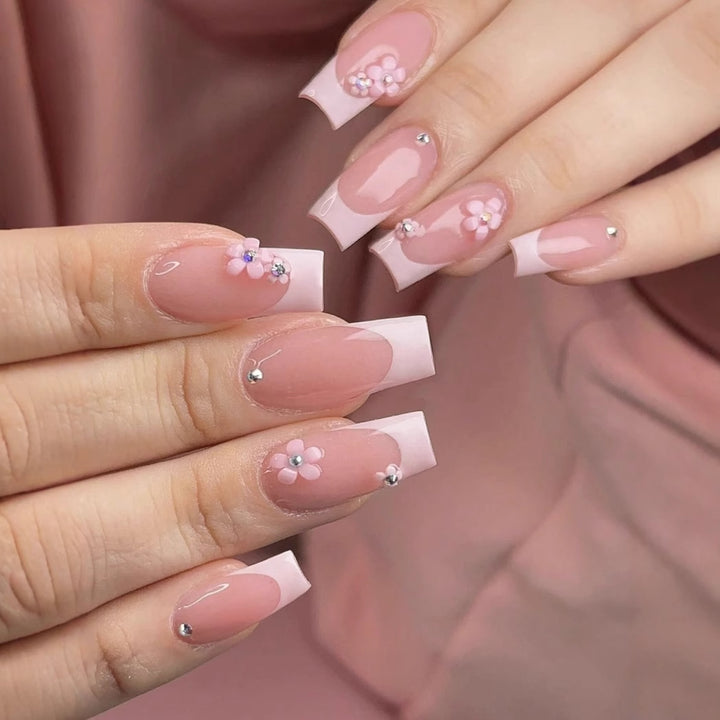 Artificial nail set with elegant 3D flowers and glamorous rhinestone accents Stornfield