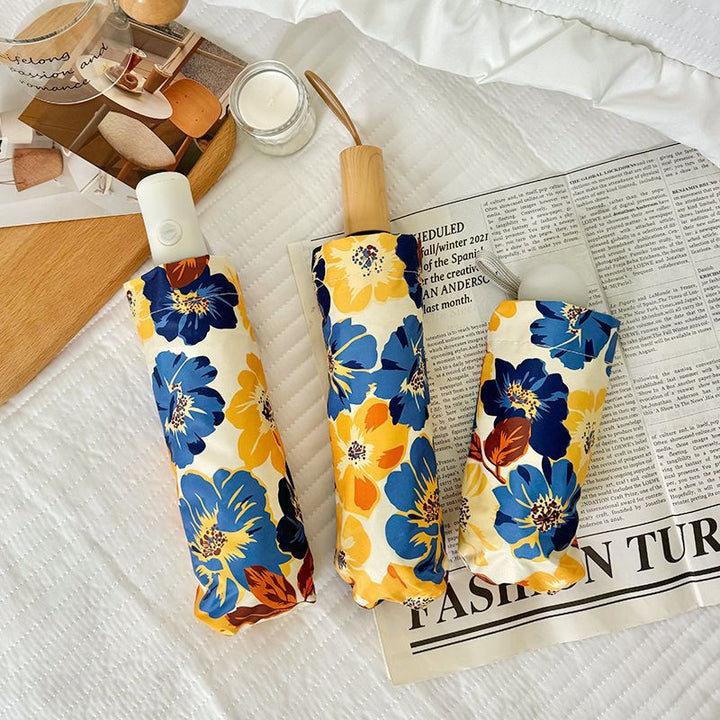 Women Folding Umbrella with Detailed Floral Design Stornfield