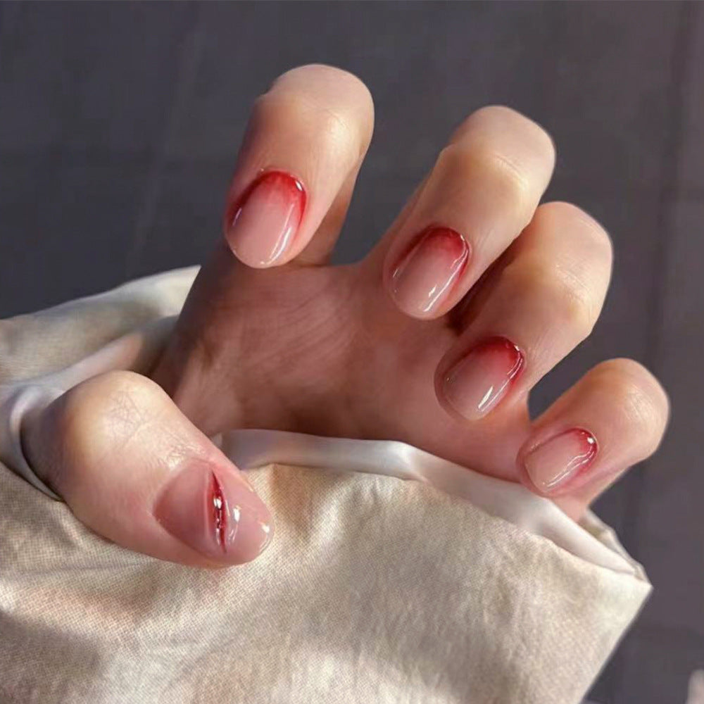 Creative Stiletto Nail Art with Blood Red Accents Stornfield
