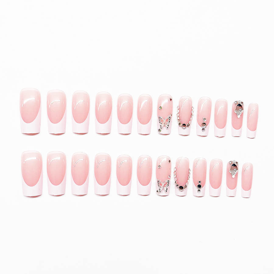 Acrylic nail set with elegant rhinestone and glitter decorations Stornfield