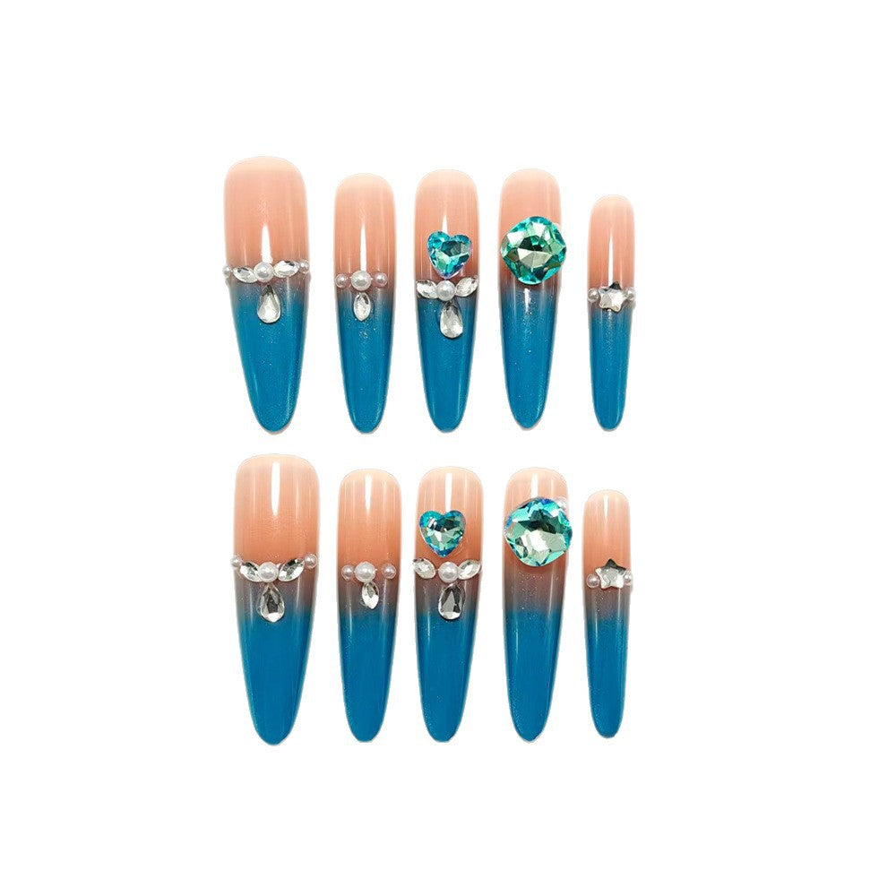 Artificial nails with glitter and rhinestone embellishments Stornfield