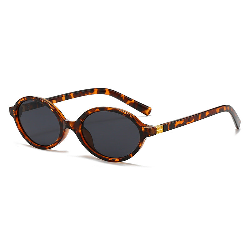 Women's fashionable oval glasses with golden accents Stornfield