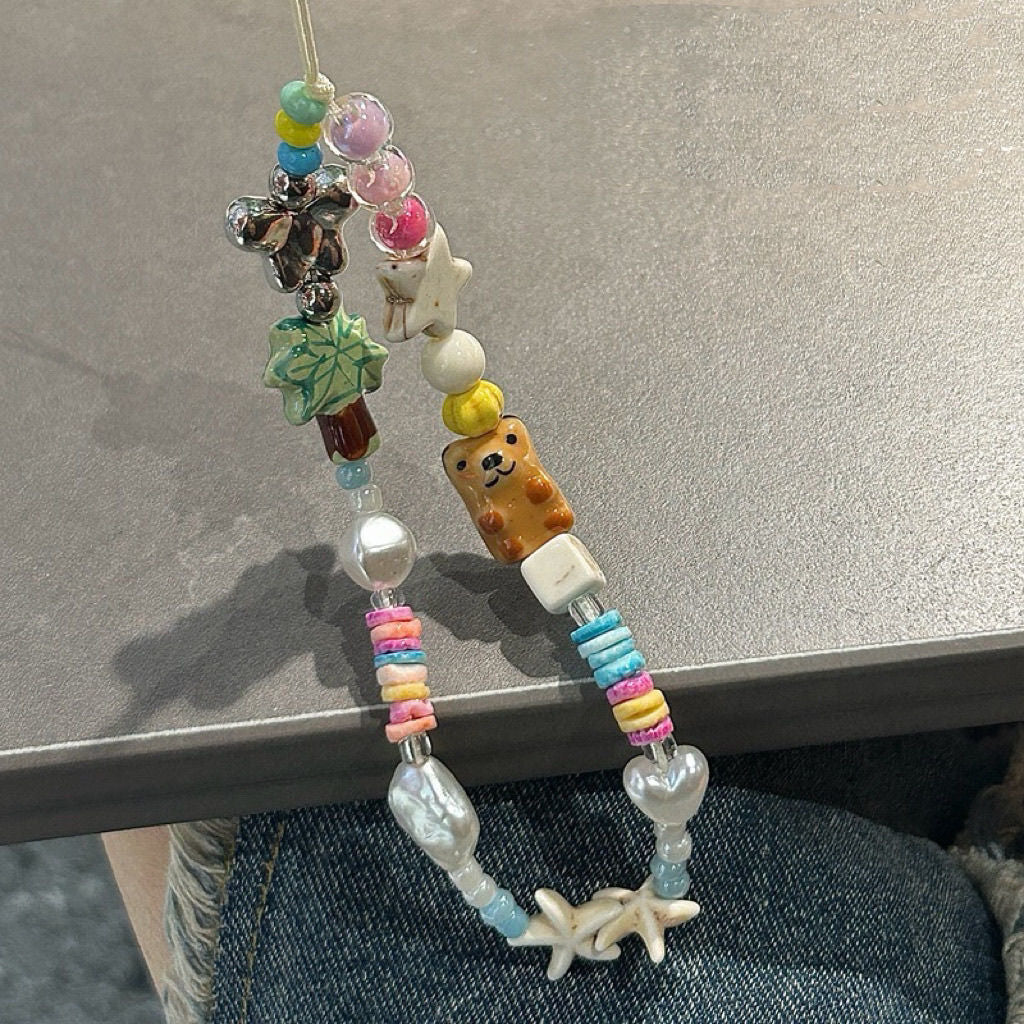 Playful Themed Beaded Charm Eyewear Necklace Stornfield