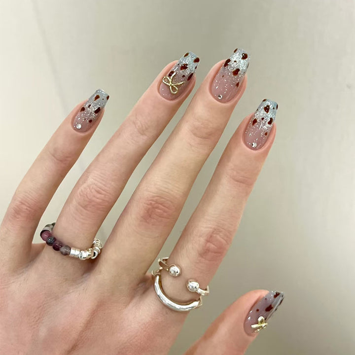 Decorative Press-On Nail Set with Glitter and Floral Accents Stornfield