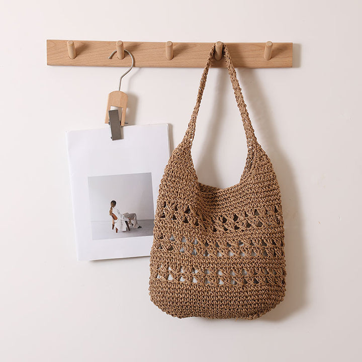 Crocheted shoulder bag with decorative hole pattern Stornfield