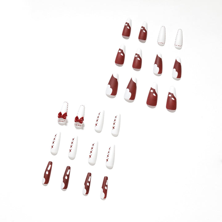 Artful stiletto nails with bow and zigzag design Stornfield