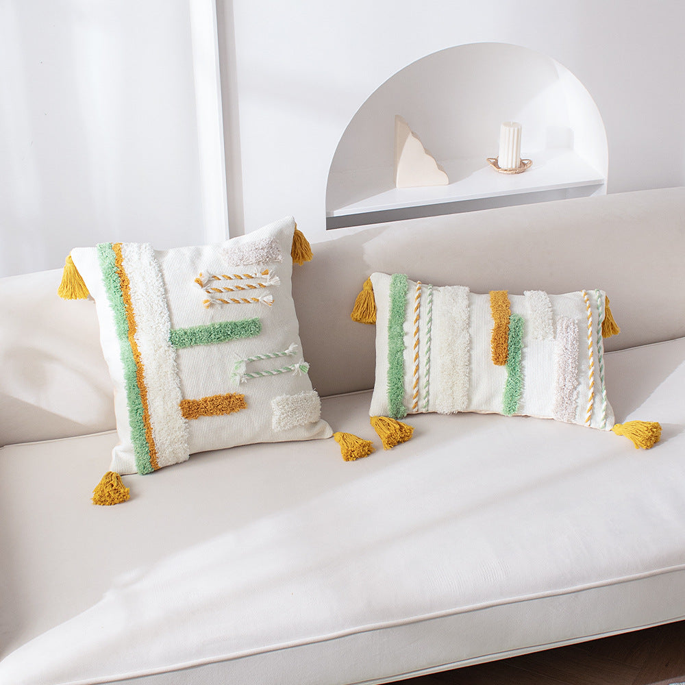 Decorative cotton cushion with hand-tufted relief and decorative tassels Stornfield