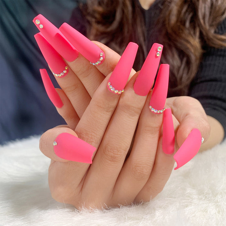 Artificial nail set with matte finish and sparkling rhinestone embellishments Stornfield