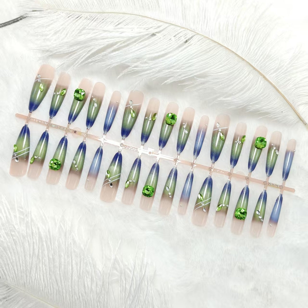 Artificial nails with elegant gradient color and glitter accents Stornfield