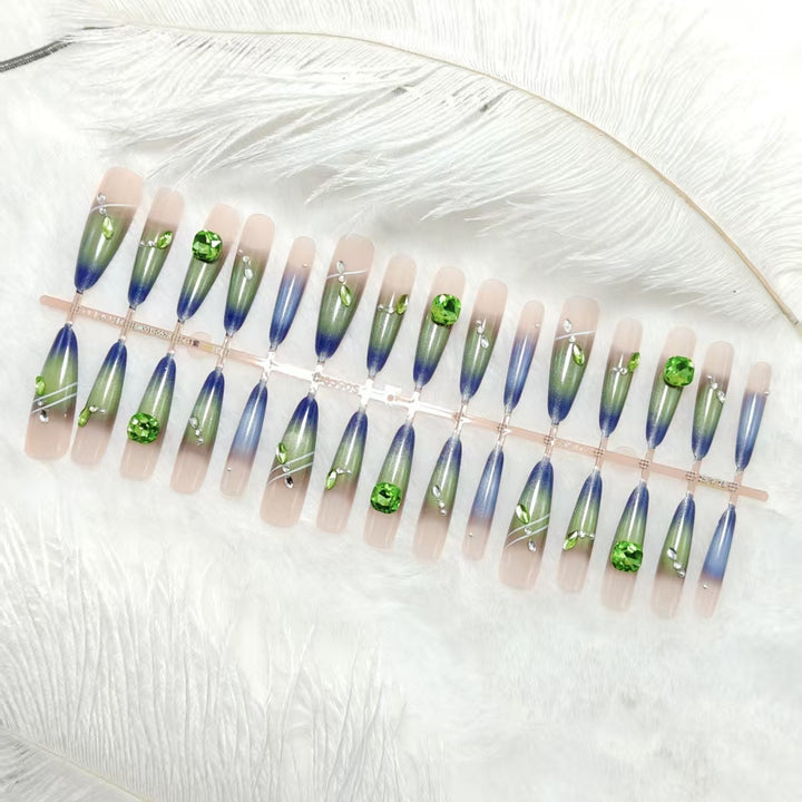 Artificial nails with elegant gradient color and glitter accents Stornfield