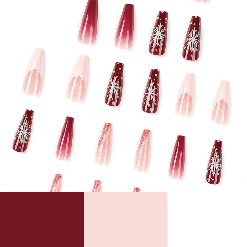 Artful Christmas nail extensions with elegant glitter and snowflake design Stornfield