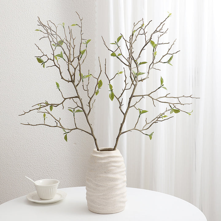 Decorative art branch with natural leaves