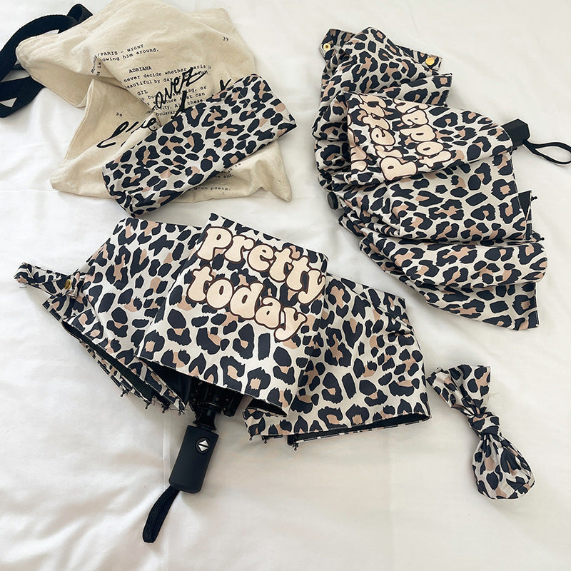 Women's Foldable Umbrella with Dynamic Leopard Pattern Stornfield