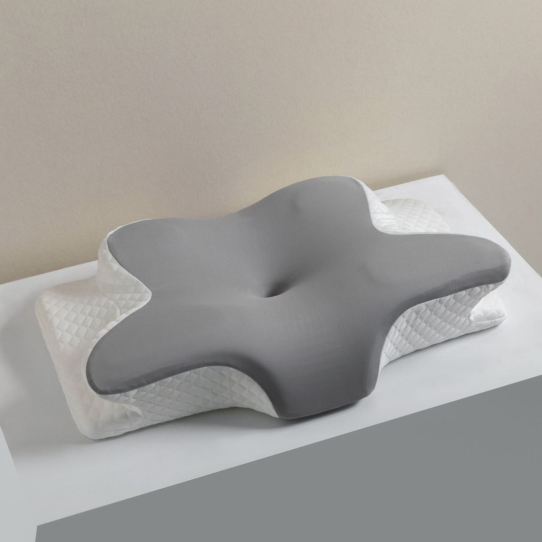 Ergonomic pillow with contoured design for optimal sleep Stornfield