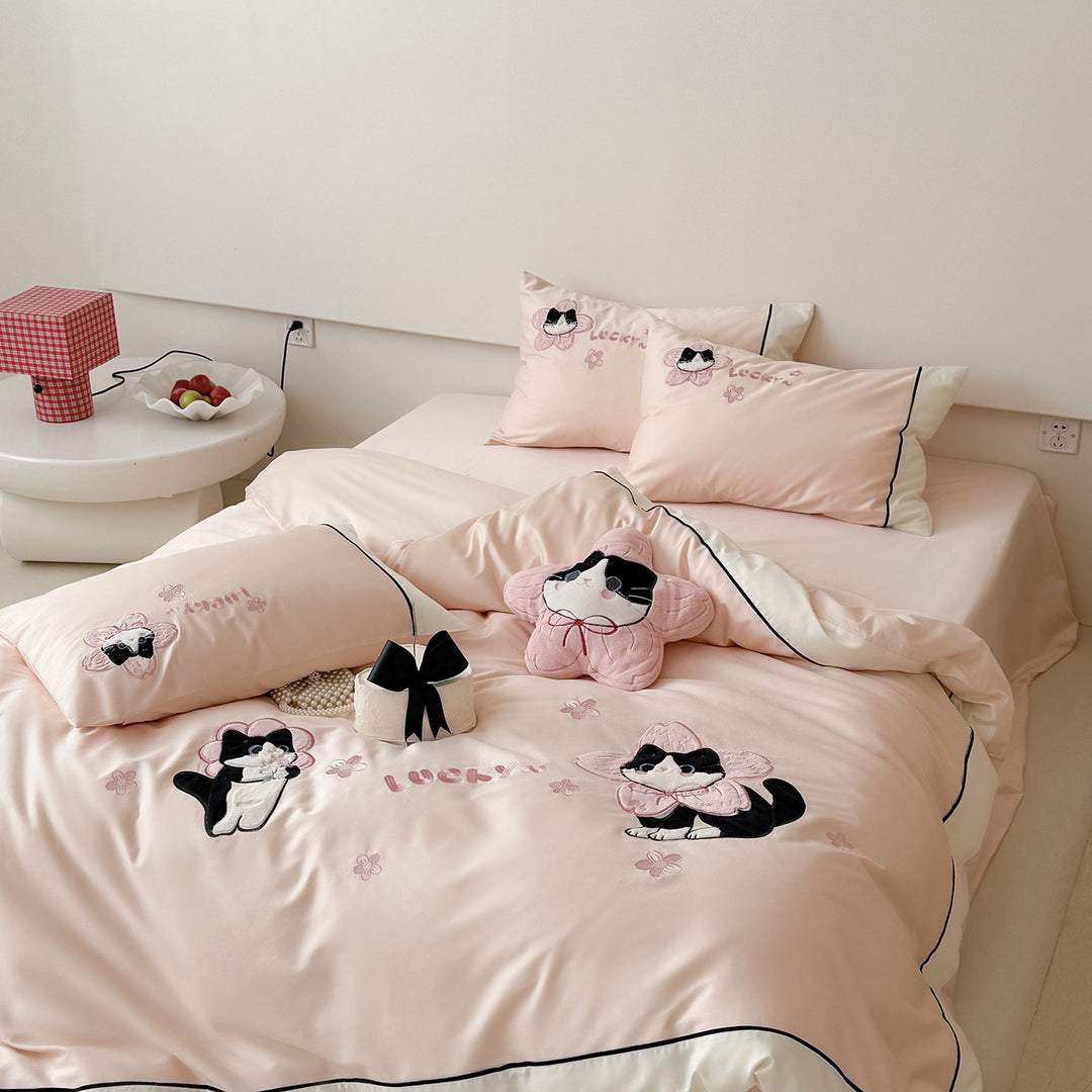 Bedding set with embroidered cat appliqués and soft cotton satin
