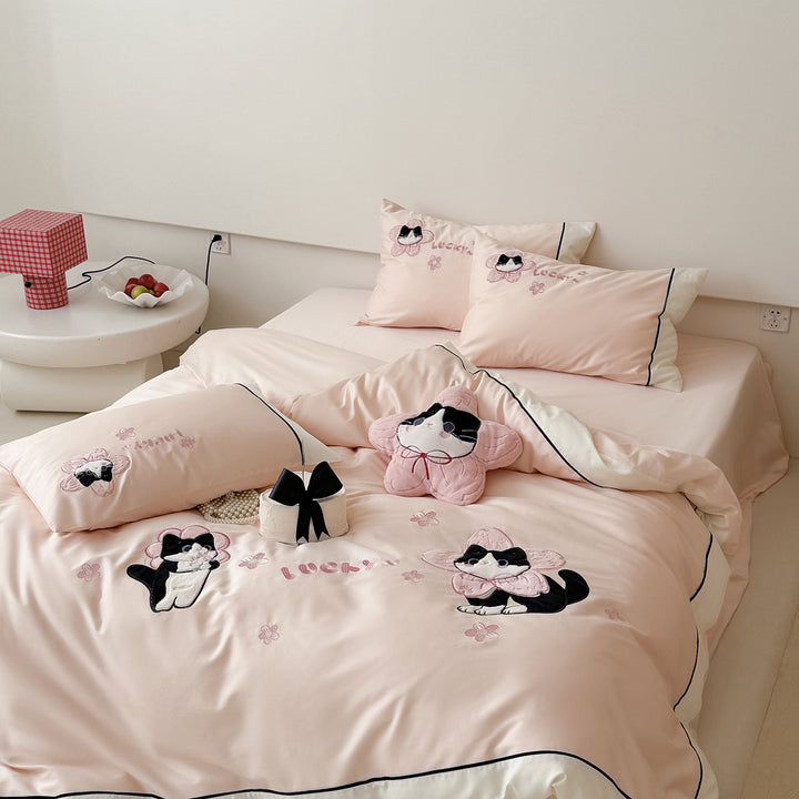 Bedding set with embroidered cat appliqués and soft cotton satin