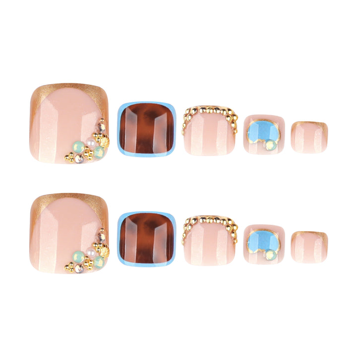Artistic toenail art with elegant gold design Stornfield